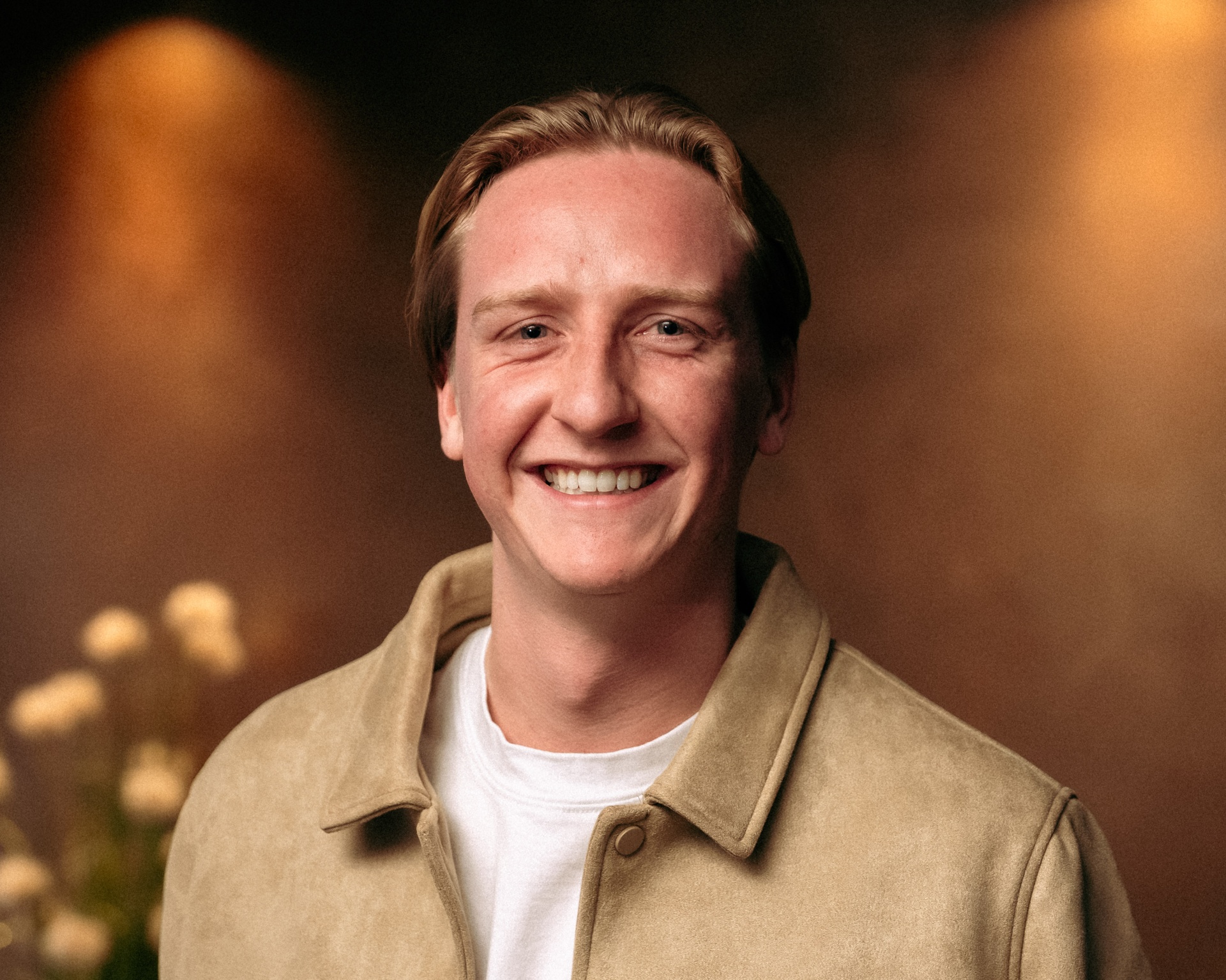 Portretfoto van een lachende Floris